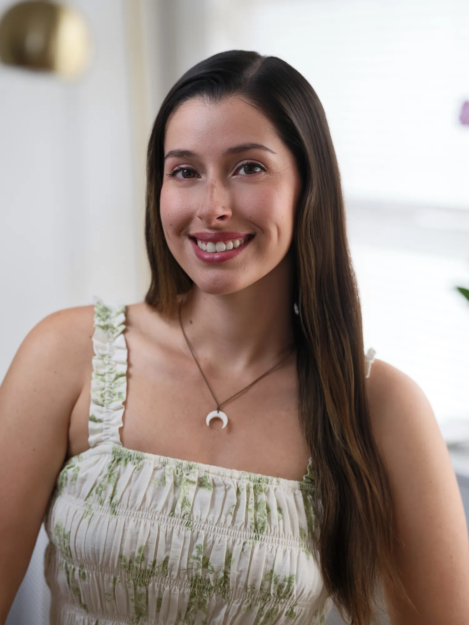Portrait of Jaclyn, founder of Drift & Bloom, smiling warmly